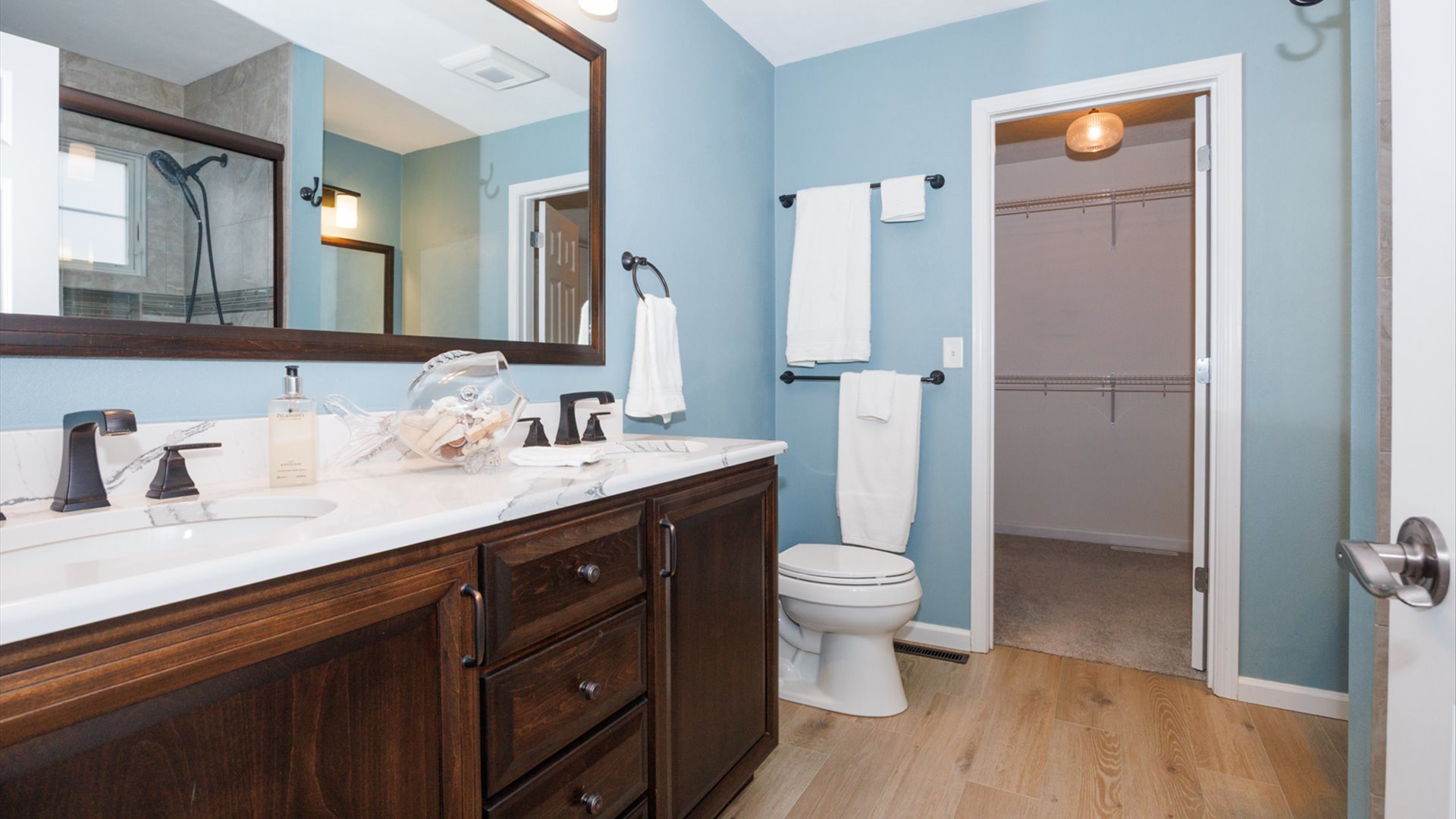 1170 Lynx Lane Normal, IL 61761 - Photo 24 of 46 a bathroom with a double vanity sink toilet and mirror