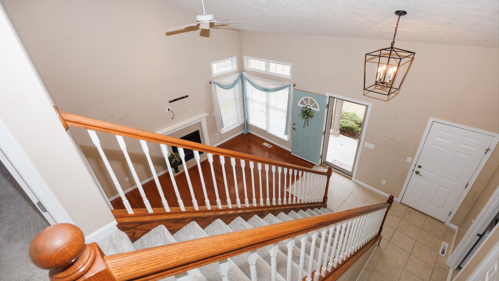 1170 Lynx Lane Normal, IL 61761 - Photo 31 of 46 a view of staircase with wooden floor