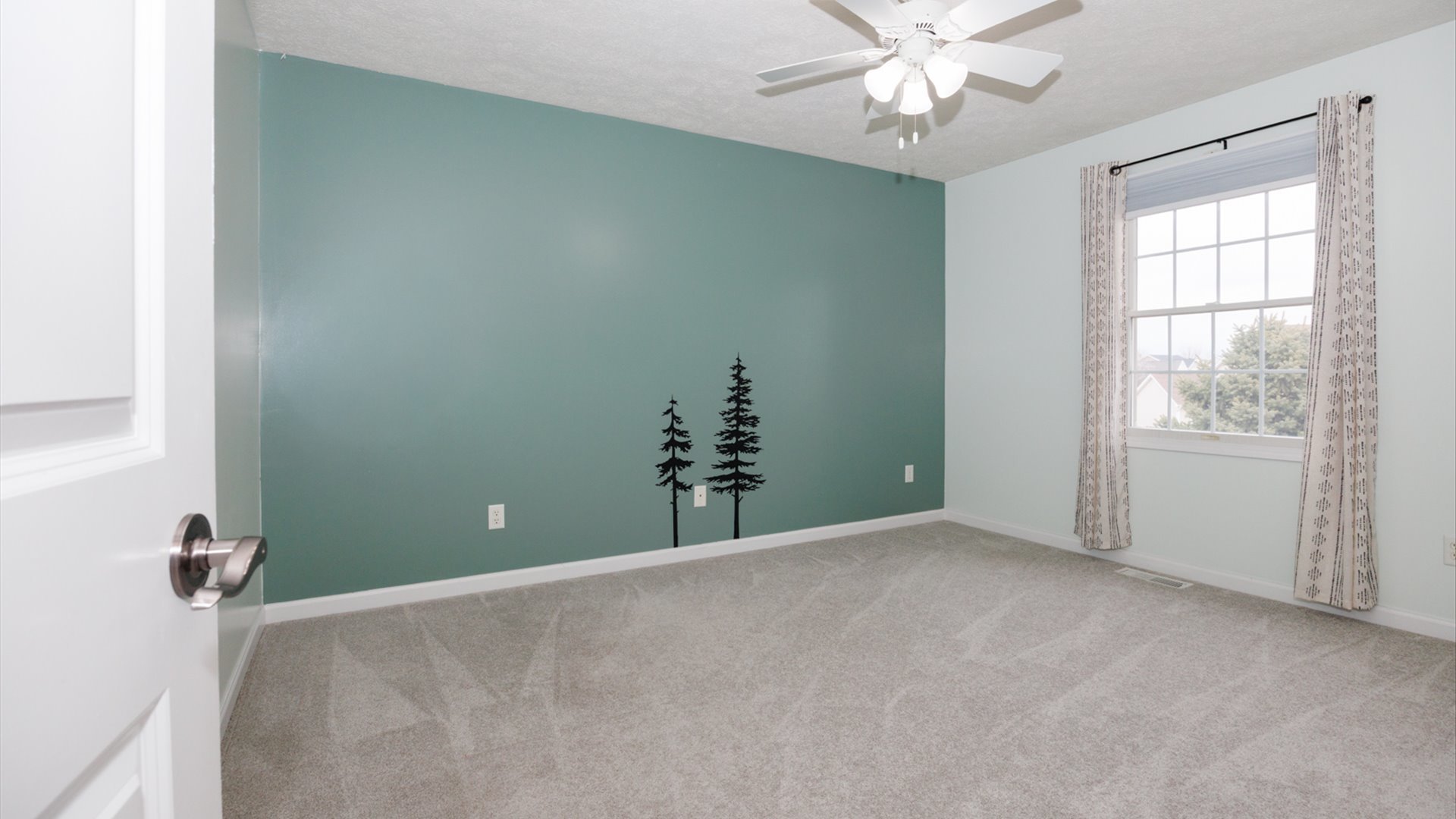 1170 Lynx Lane Normal, IL 61761 - Photo 34 of 46 an empty room with windows and fan