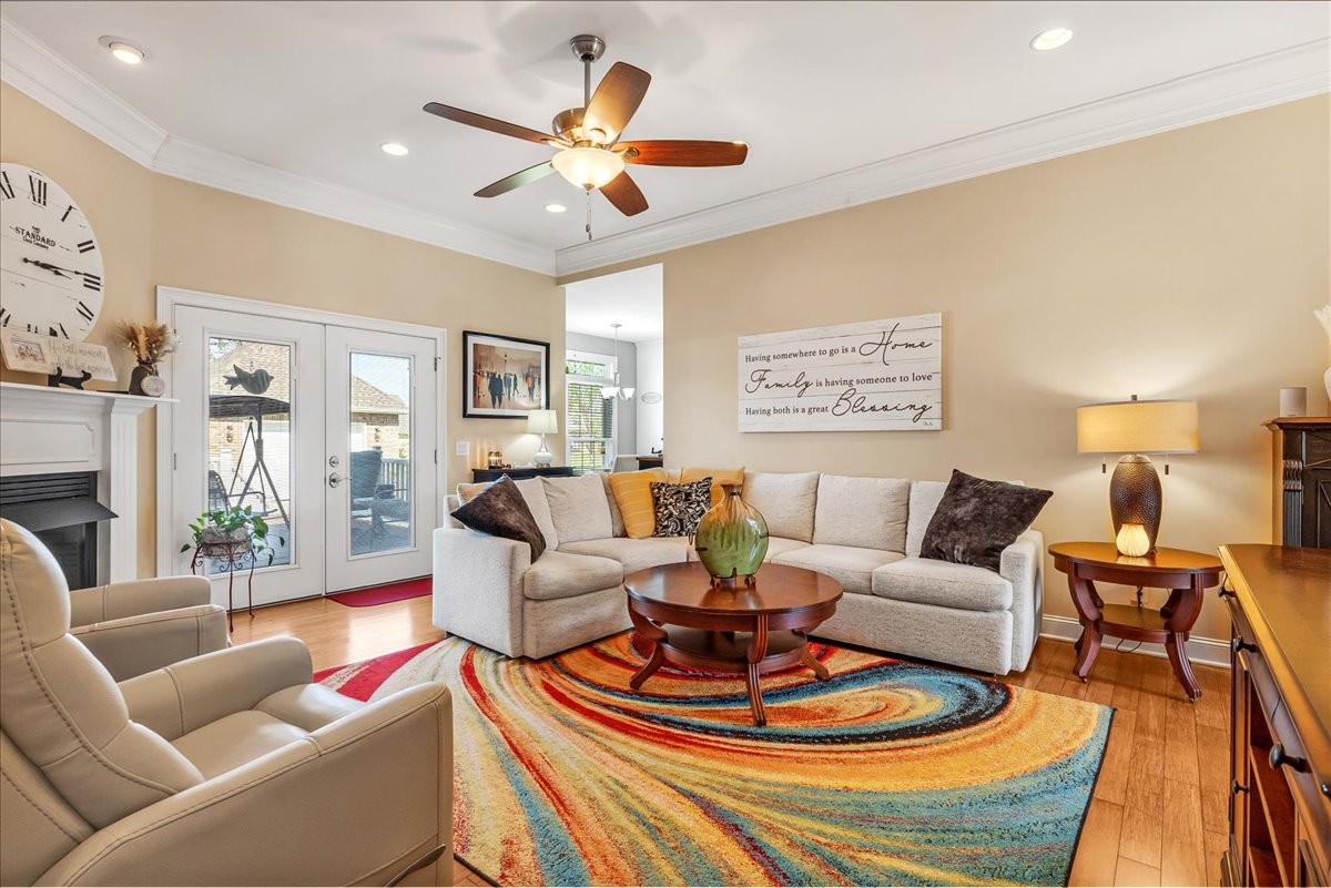 190 Stonegate Drive Smithville, TN 37166 - Photo 15 of 71 a living room with furniture a fireplace and a large window