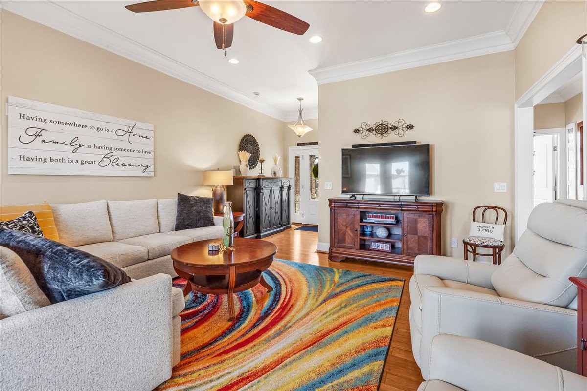 190 Stonegate Drive Smithville, TN 37166 - Photo 16 of 71 a living room with fireplace furniture and a flat screen tv