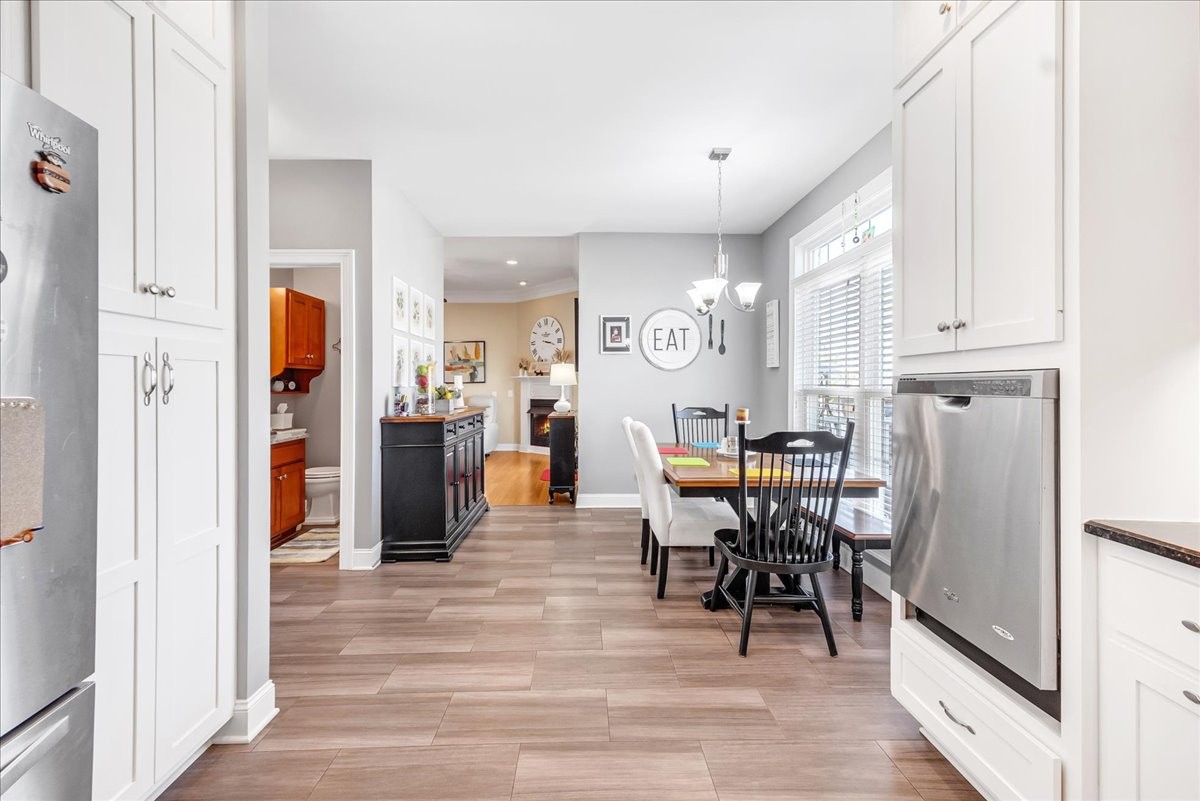 190 Stonegate Drive Smithville, TN 37166 - Photo 23 of 71 a view of a dining room with furniture and wooden floor