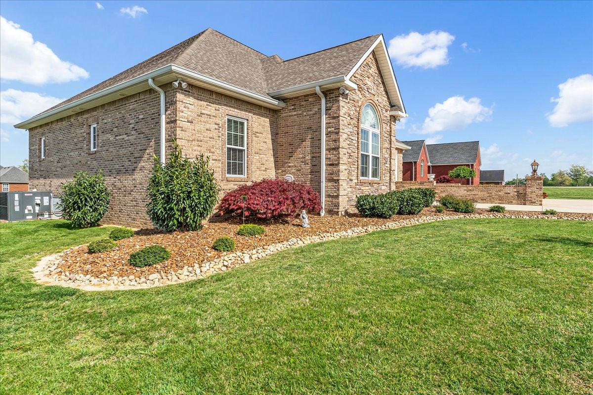 190 Stonegate Drive Smithville, TN 37166 - Photo 9 of 71 a front view of a house with a yard