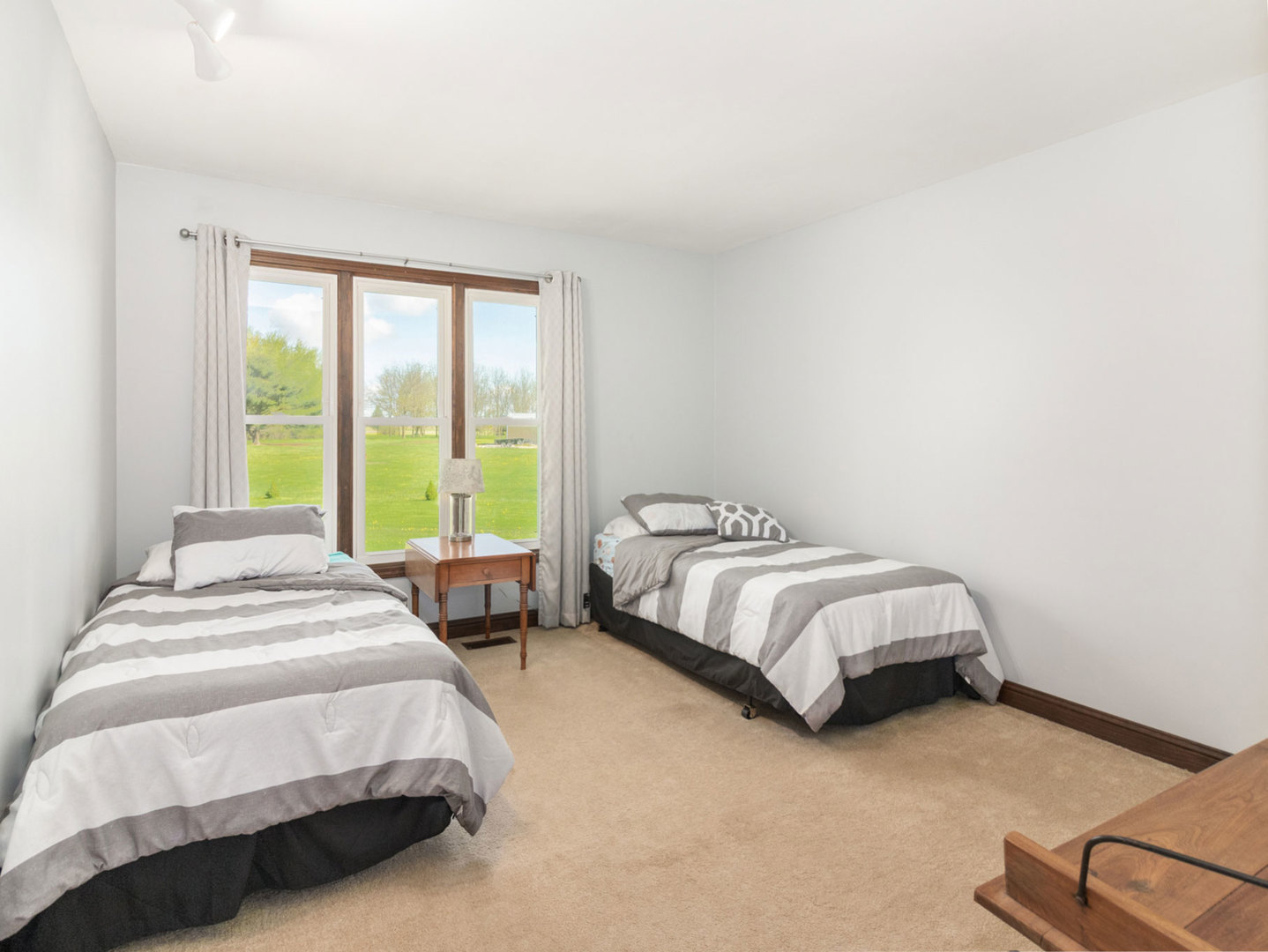 3017 Graham Road Somonauk, IL 60552 - Photo 15 of 30 a bed sitting in a bedroom next to a window