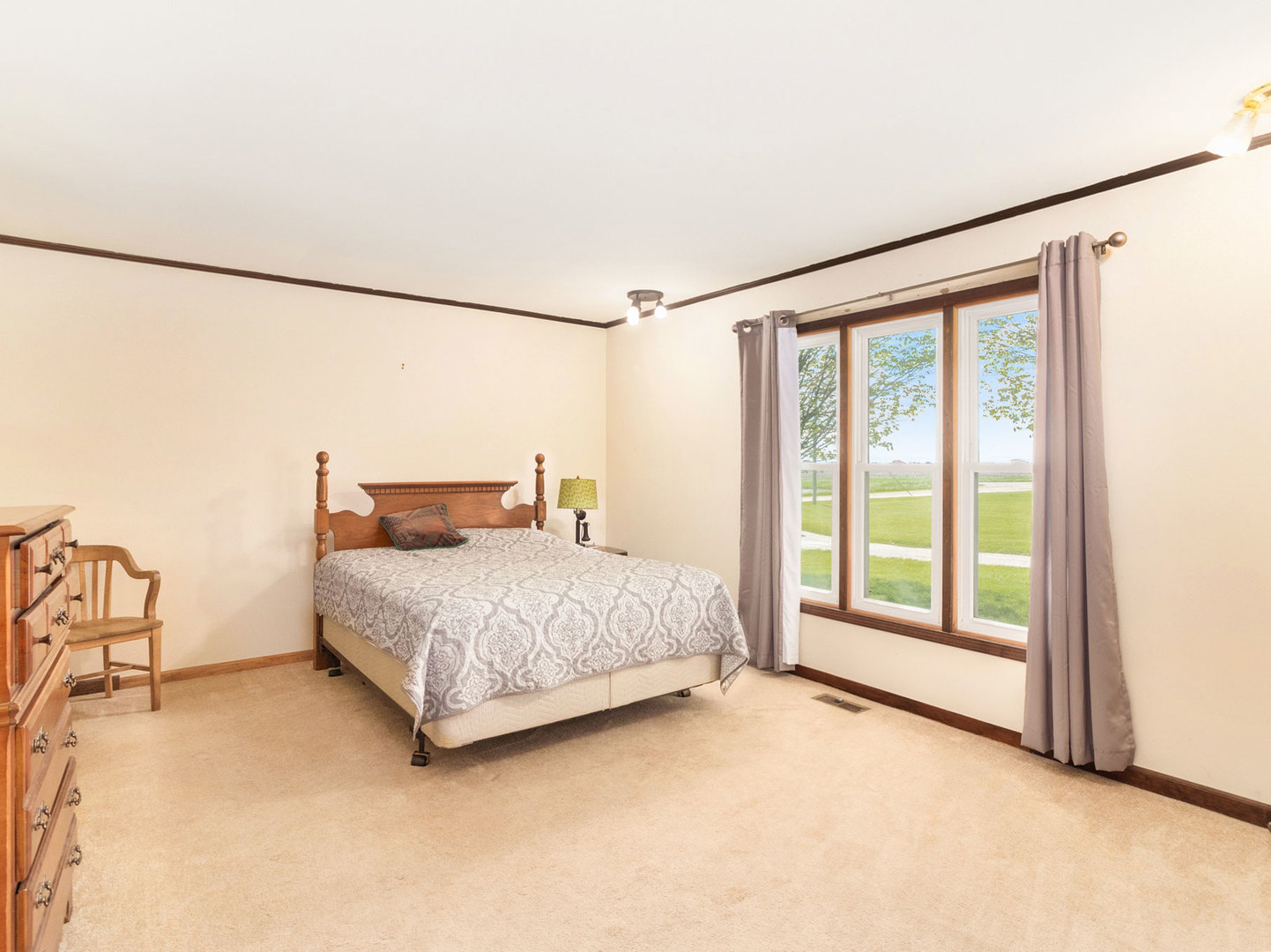 3017 Graham Road Somonauk, IL 60552 - Photo 17 of 30 a bedroom with a bed and a large window