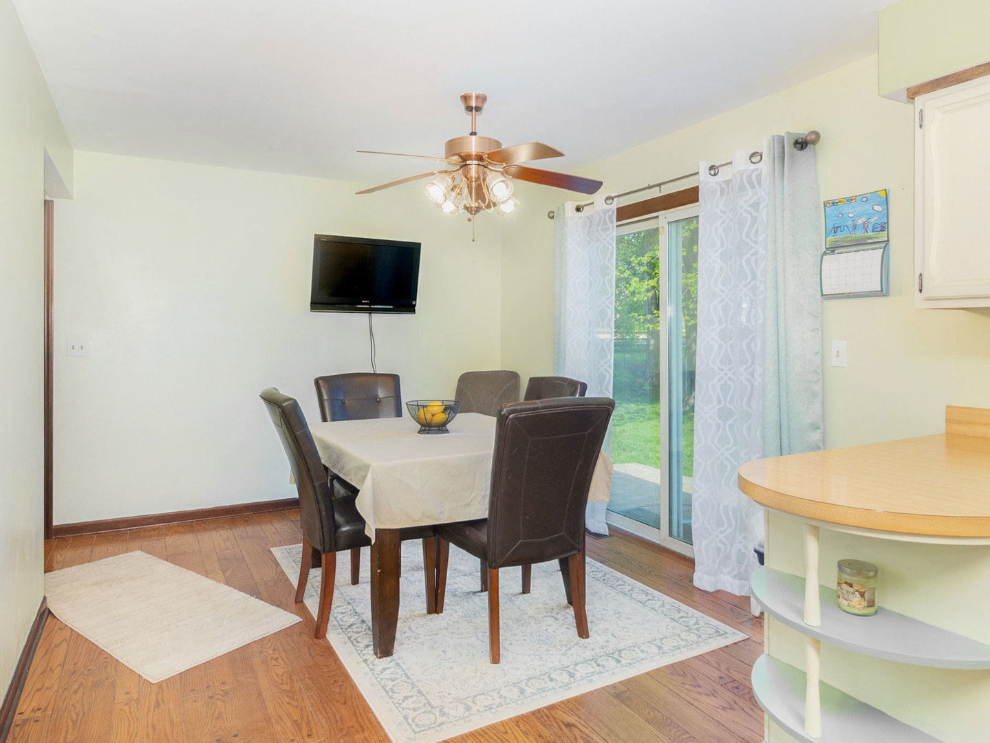 3017 Graham Road Somonauk, IL 60552 - Photo 7 of 30 a view of a dining room with furniture and wooden floor