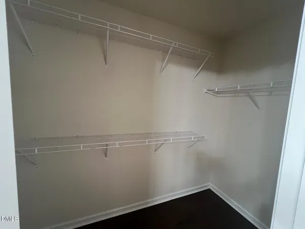 a view of an empty walk in closet
