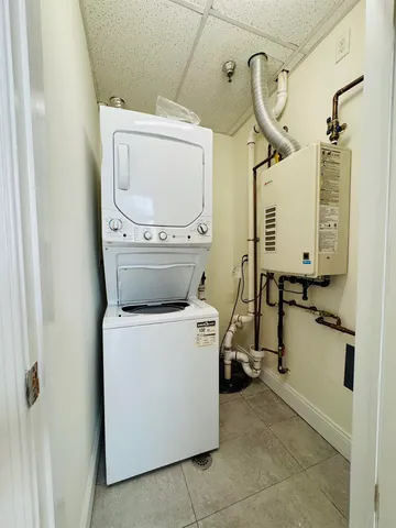 a view of staircase with a rug