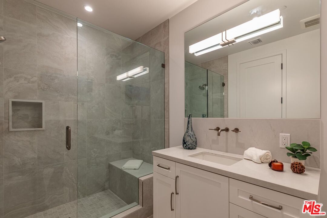 5916 Bonsall Drive Malibu, CA 90265 - Photo 12 of 20 a bathroom with a sink toilet and shower