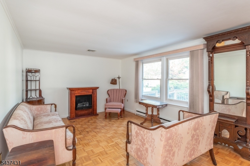 20 Wanaque Road West Milford, NJ 07421 - Photo 5 of 31 a living room with furniture and a fireplace