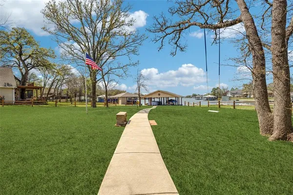 a view of a park with large trees