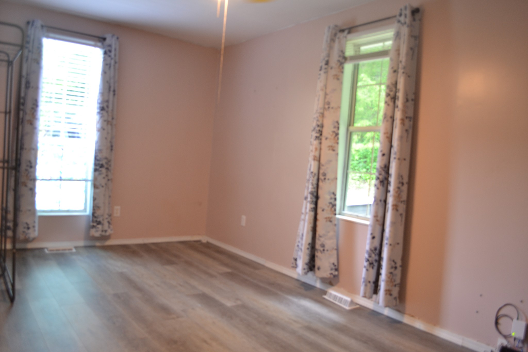 1505 Add Stafford Road Hilham, TN 38568 - Photo 17 of 65 an empty room with wooden floor and windows