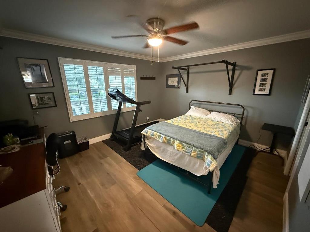 3403 Bimini Lane, Unit G2 Coconut Creek, FL 33066 - Photo 8 of 12 a bed room with furniture and a window