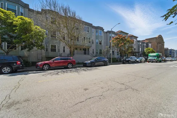 a cars parked in front of a building