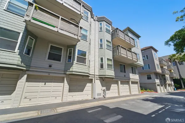 a view of a house with a street