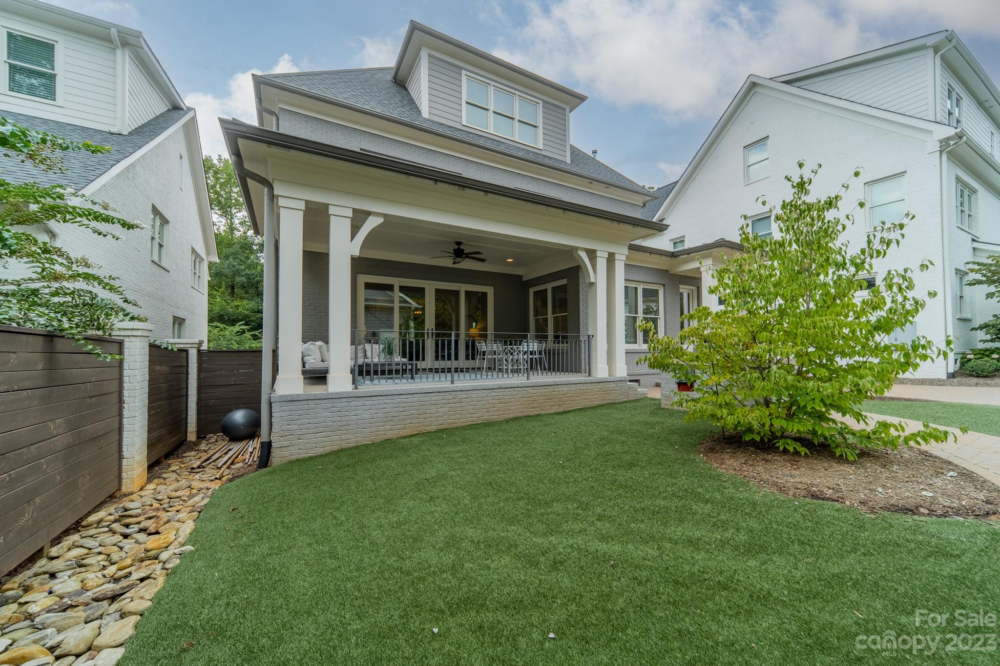 744 Ellsworth Road Charlotte, NC 28211 - Photo 4 of 31 a view of a house with garden