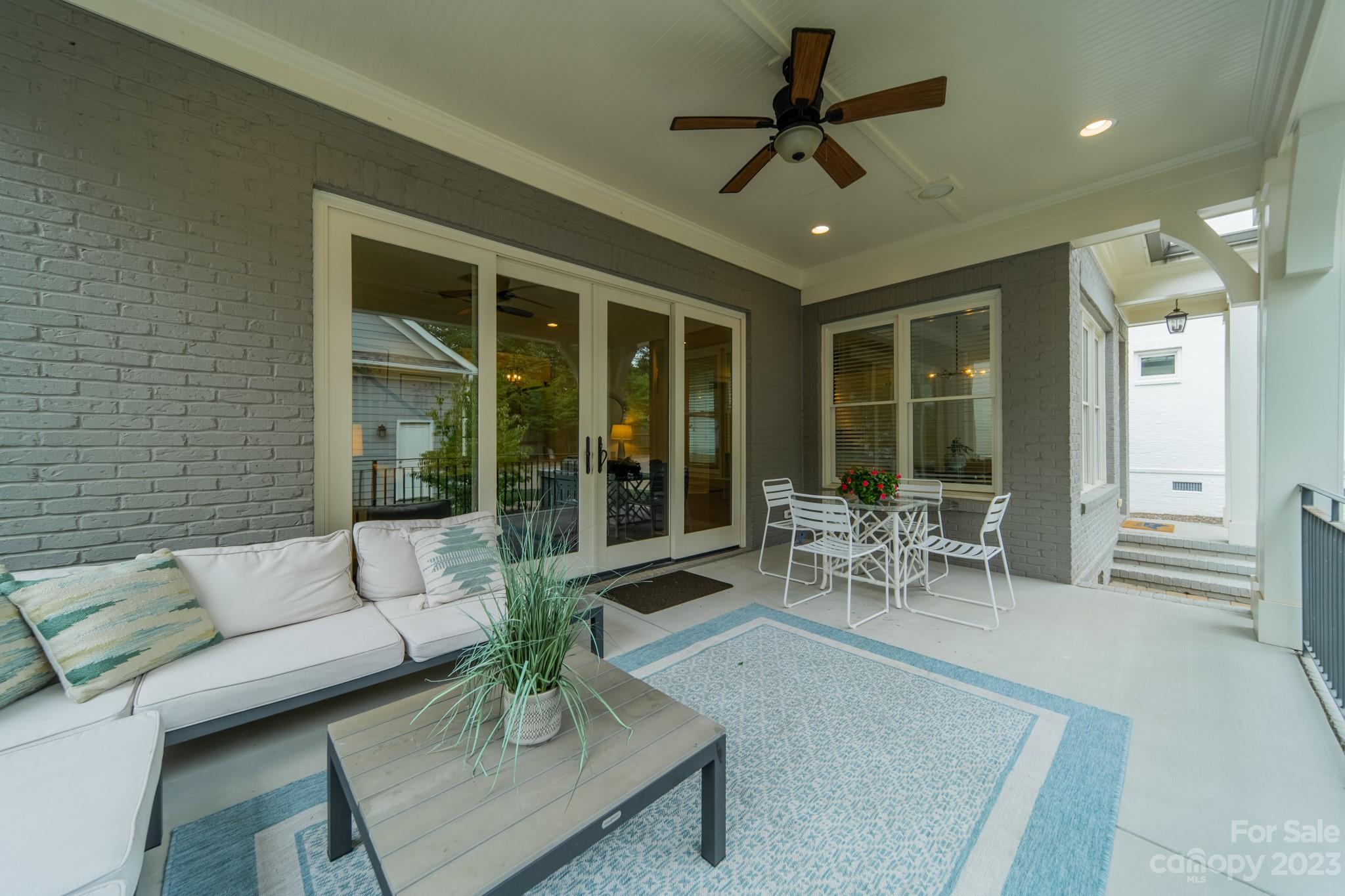 744 Ellsworth Road Charlotte, NC 28211 - Photo 6 of 31 a living room with furniture and a large window
