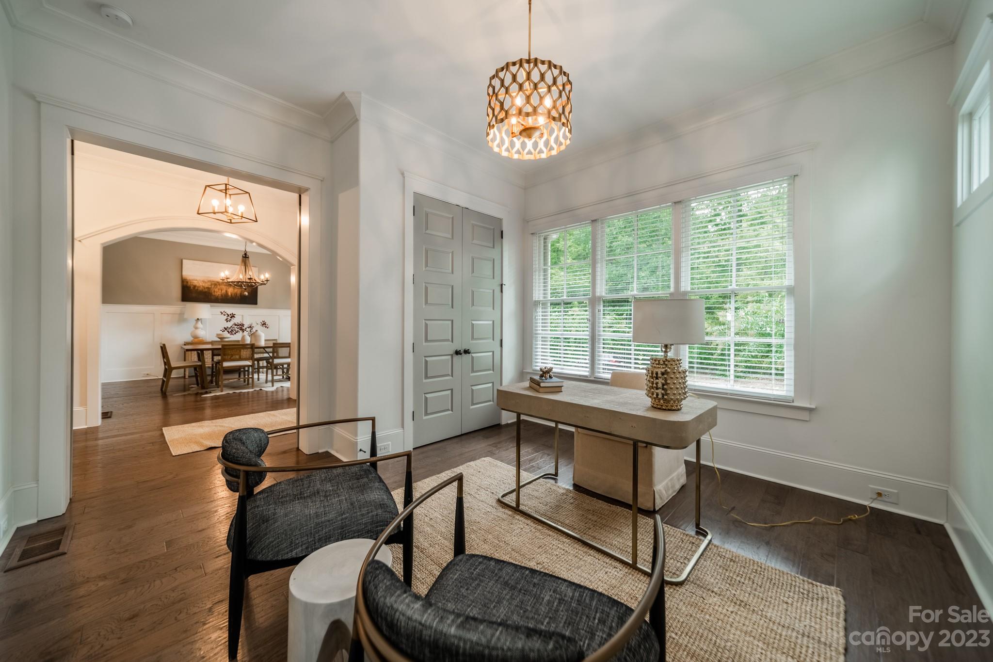 744 Ellsworth Road Charlotte, NC 28211 - Photo 9 of 31 a view of a livingroom with furniture window and wooden floor