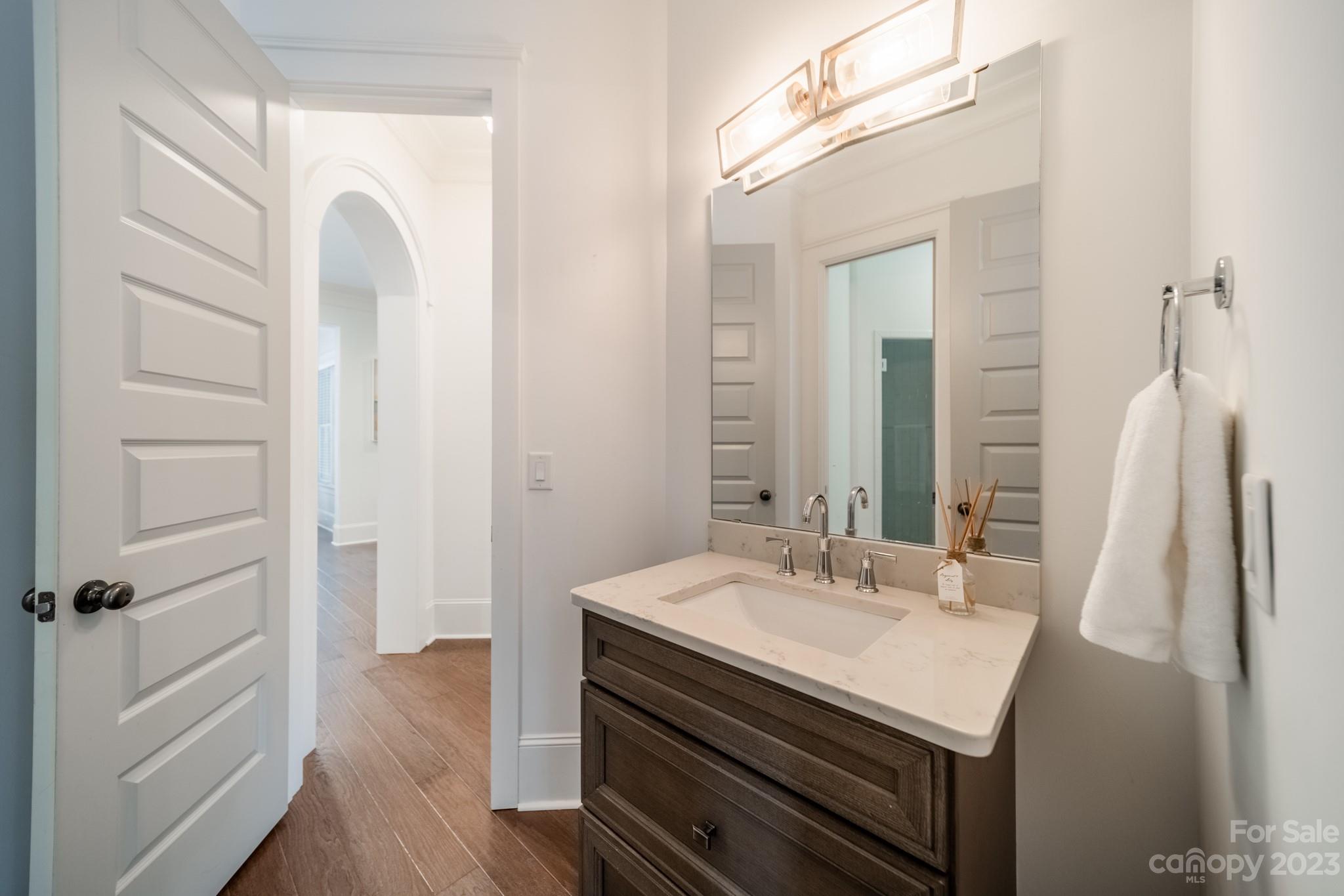 744 Ellsworth Road Charlotte, NC 28211 - Photo 10 of 31 a bathroom with a sink and a mirror