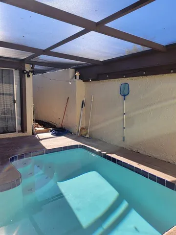 a view of entryway with stairs and a wooden floor