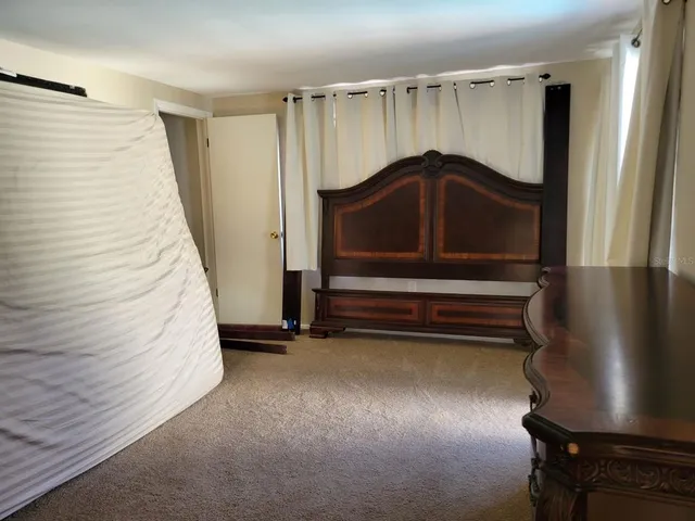 a bathroom with a tub and a sink