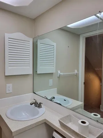 a view of a building and trees