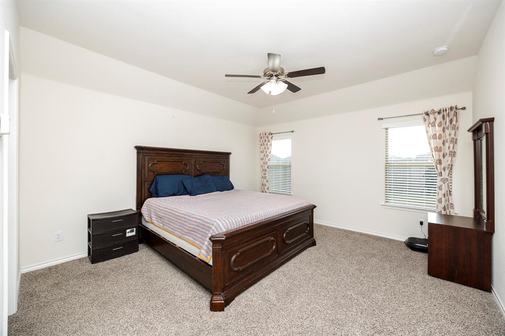 3229 Trails End Road Aubrey, TX 76227 - Photo 10 of 25 Bedroom featuring carpet flooring and ceiling fan