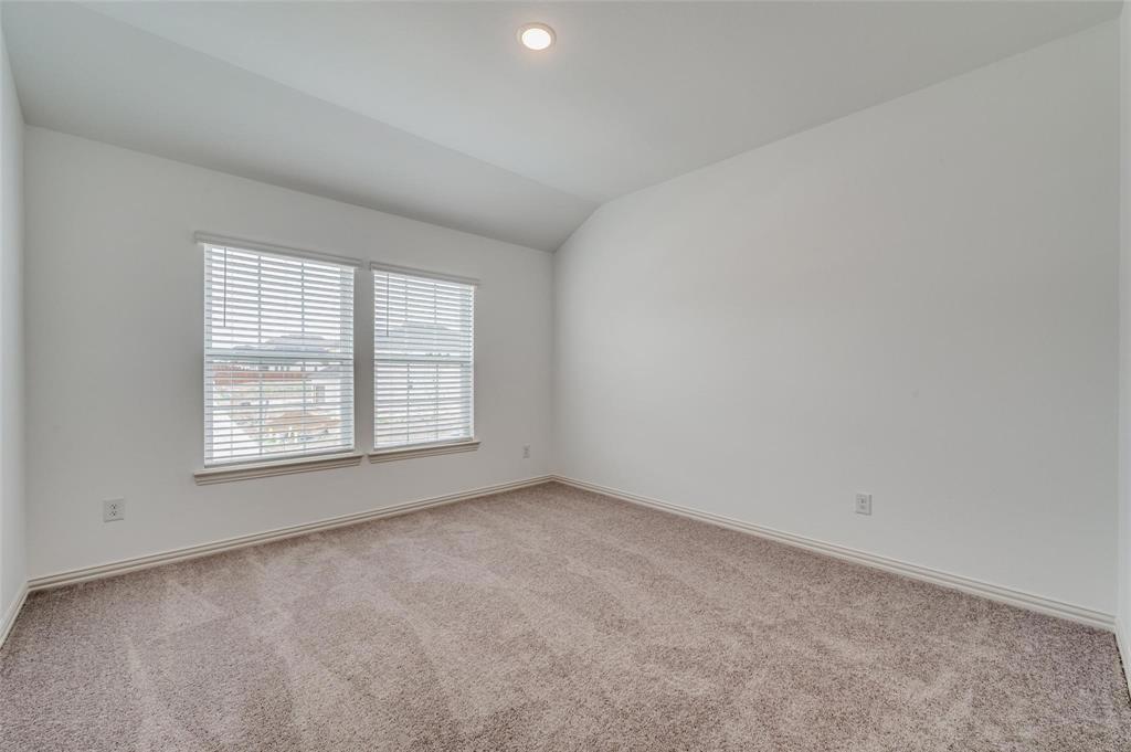 8940 Samara Street Frisco, TX 75035 - Photo 11 of 28 an empty room with a window