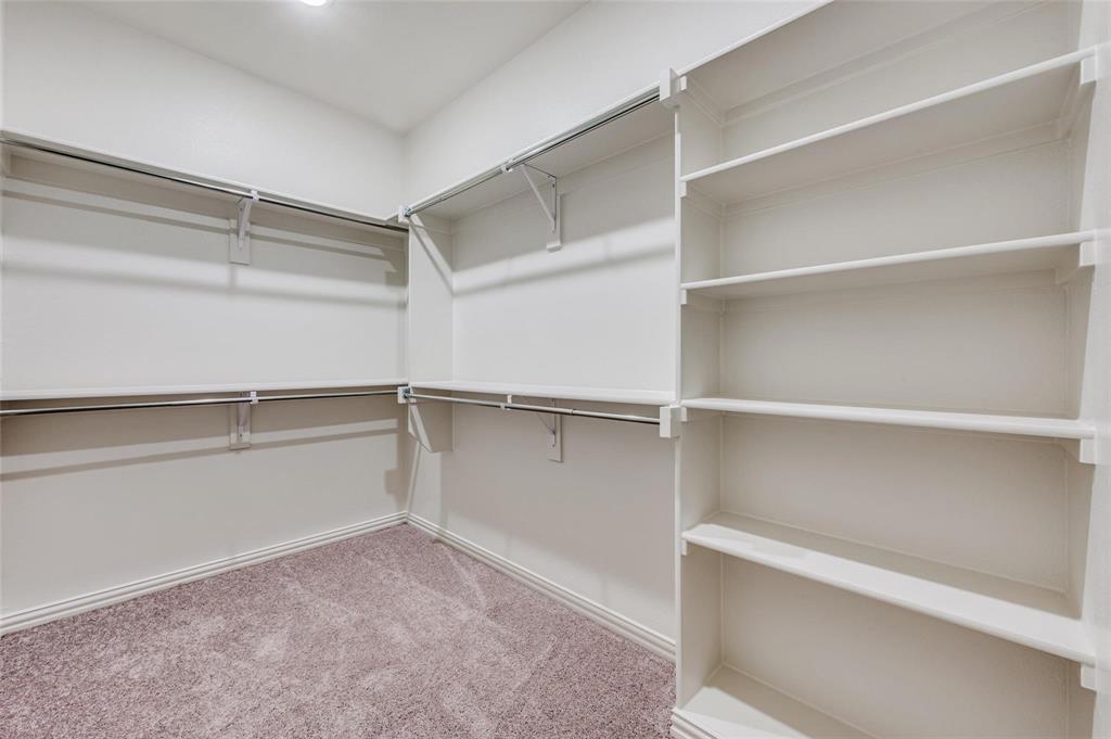 8940 Samara Street Frisco, TX 75035 - Photo 18 of 28 a view of an empty walk in closet