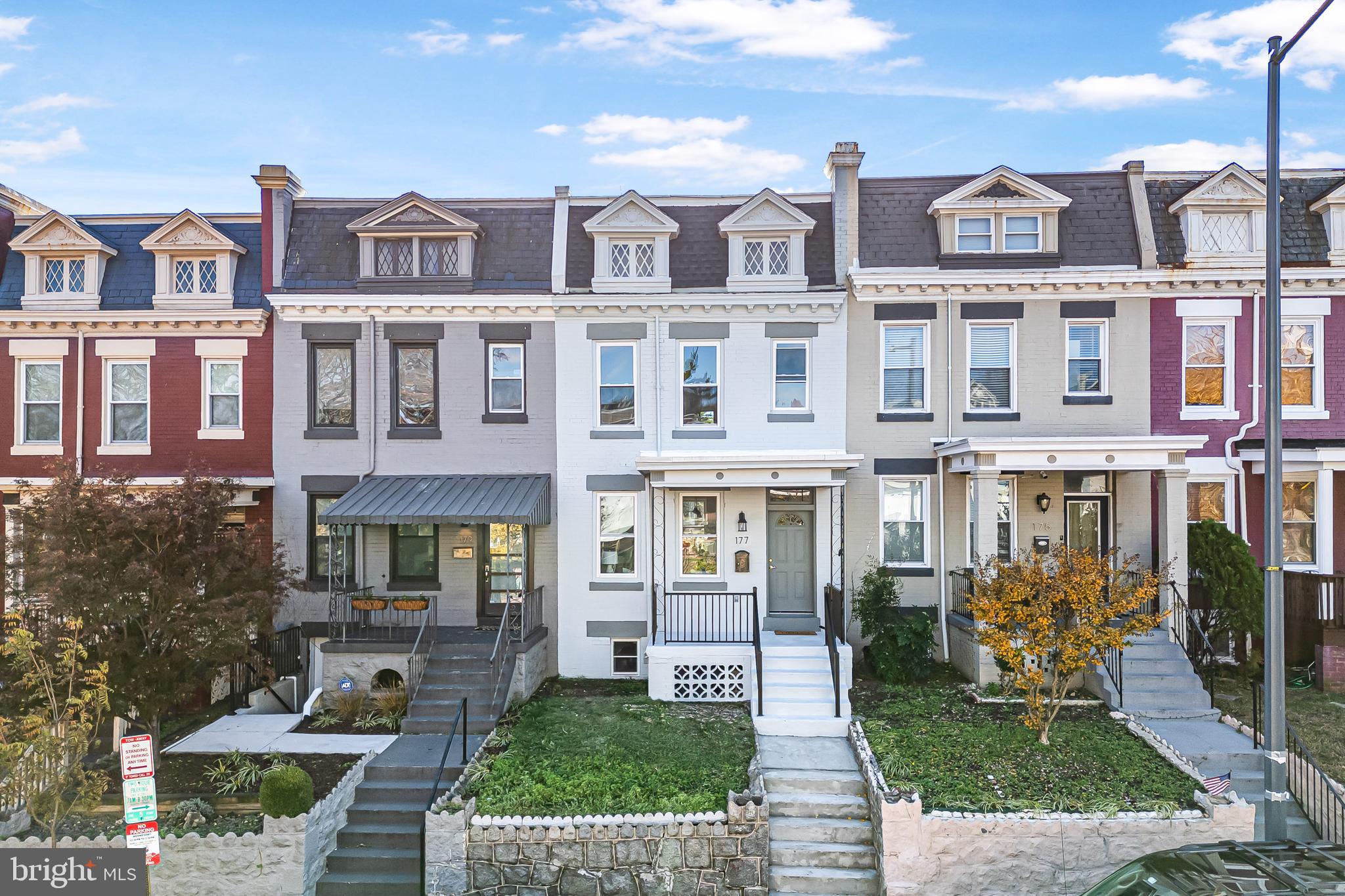 177 V Street Northeast Washington, DC 20002 - Photo 1 of 32 a front view of a residential apartment building with a yard