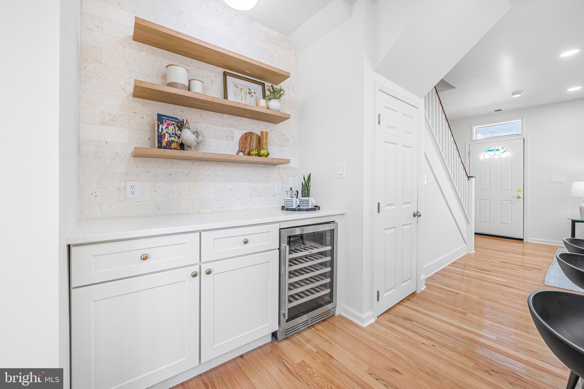 177 V Street Northeast Washington, DC 20002 - Photo 12 of 32 a view of kitchen with cabinets and wooden floor