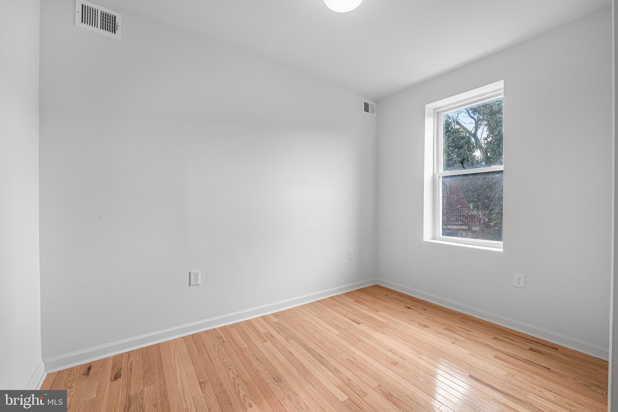 177 V Street Northeast Washington, DC 20002 - Photo 21 of 32 an empty room with a window