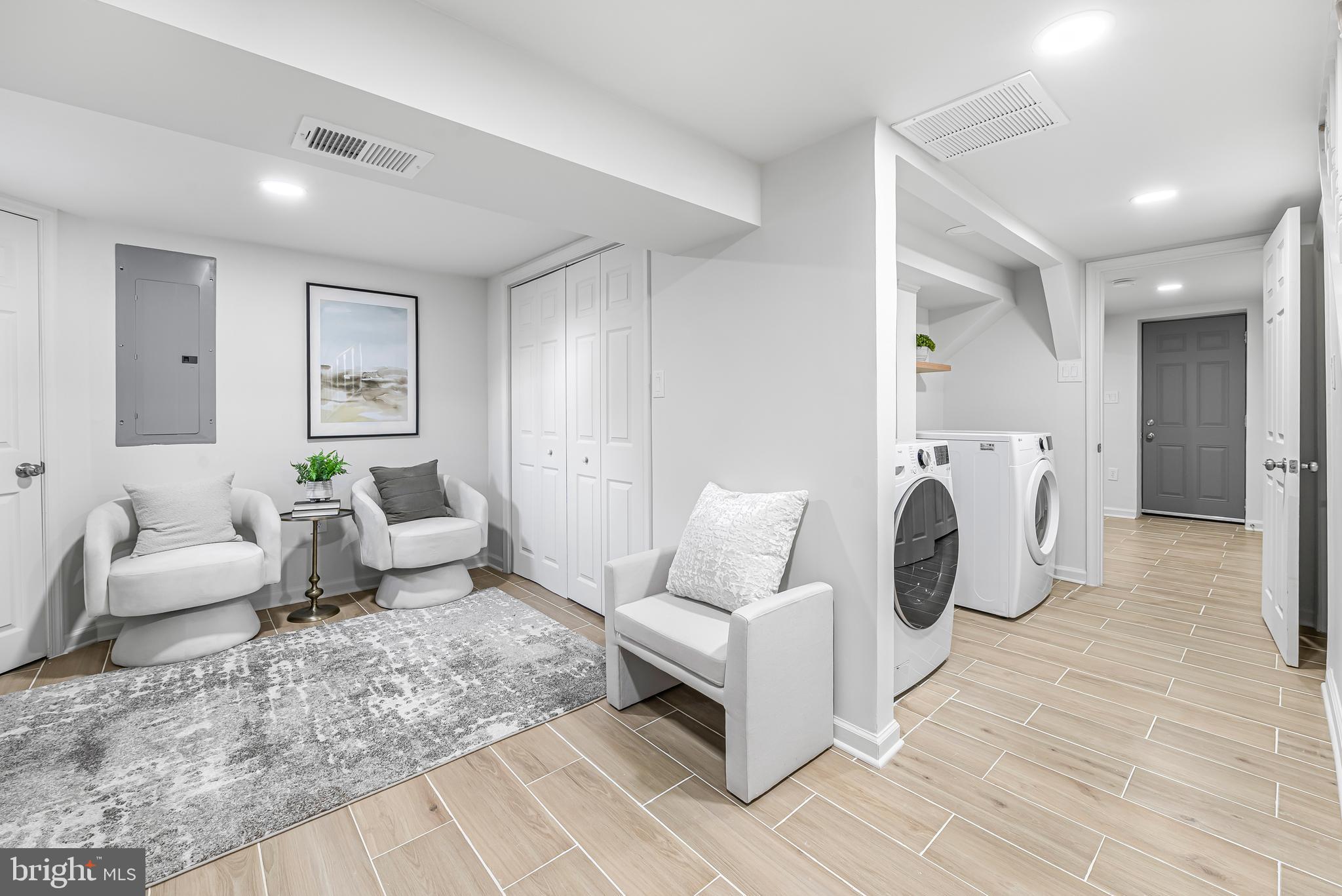 177 V Street Northeast Washington, DC 20002 - Photo 24 of 32 a living room with furniture and a couch