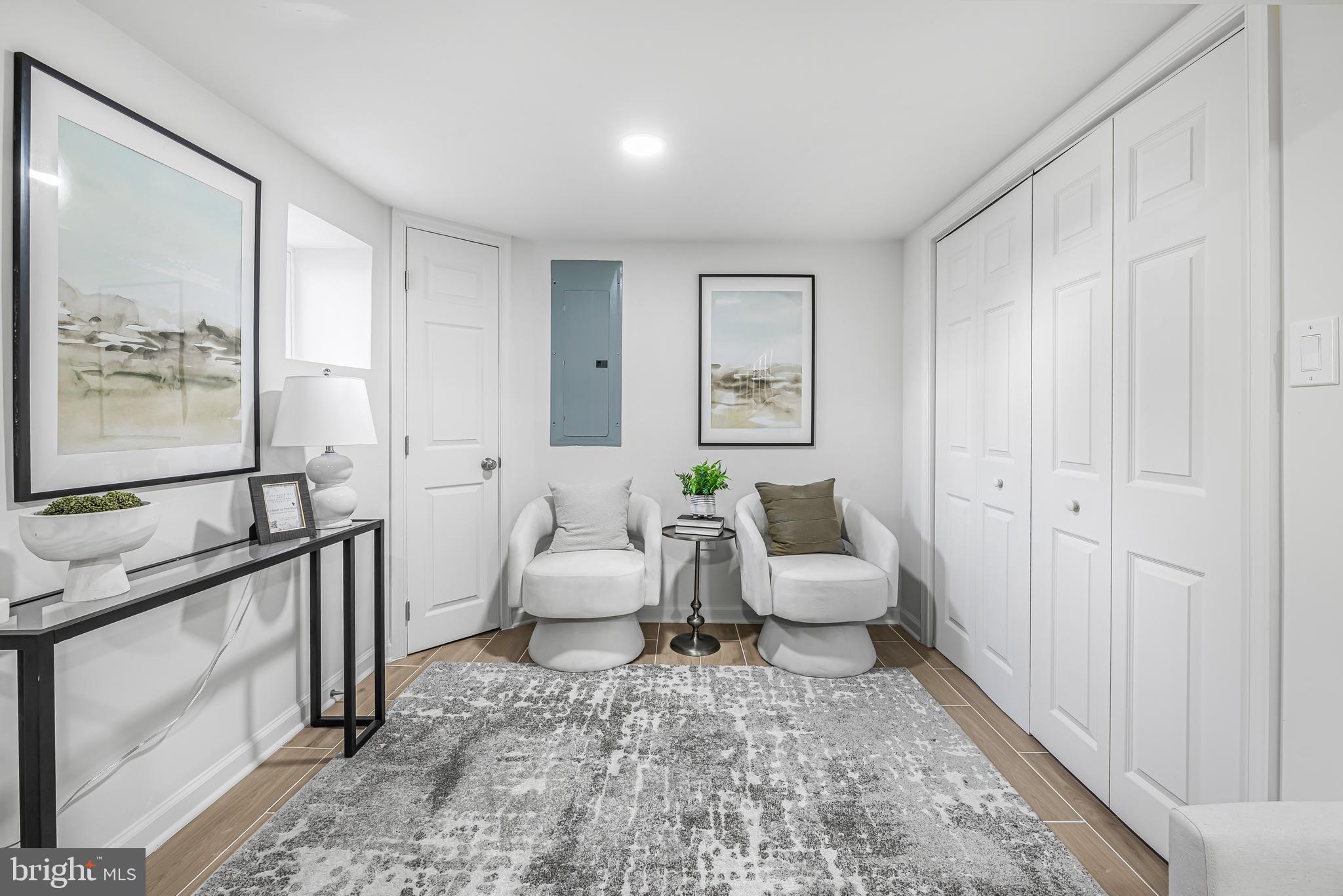 177 V Street Northeast Washington, DC 20002 - Photo 25 of 32 a living room with furniture and a window