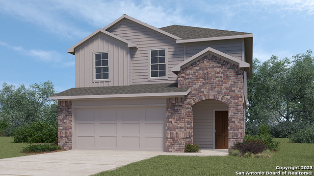 225 Legendary Trail Loop Floresville, TX 78114 - Photo 1 of 1 a front view of a house with a garden and plants
