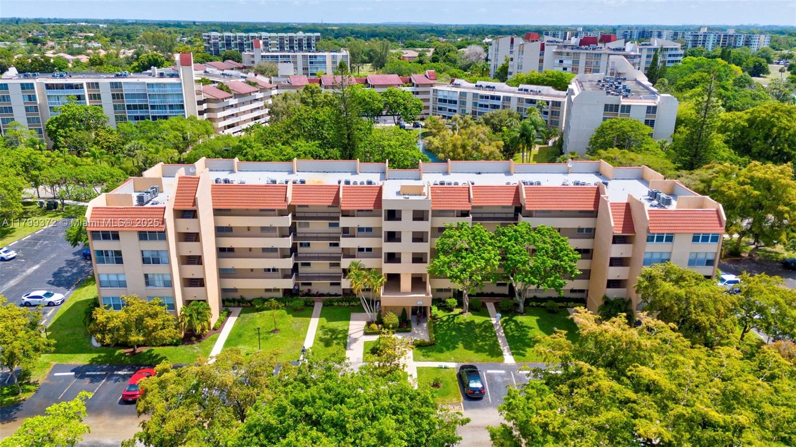7080 Environ Boulevard, Unit 223 Lauderhill, FL 33319 - Photo 22 of 36 a view of a city and tall buildings