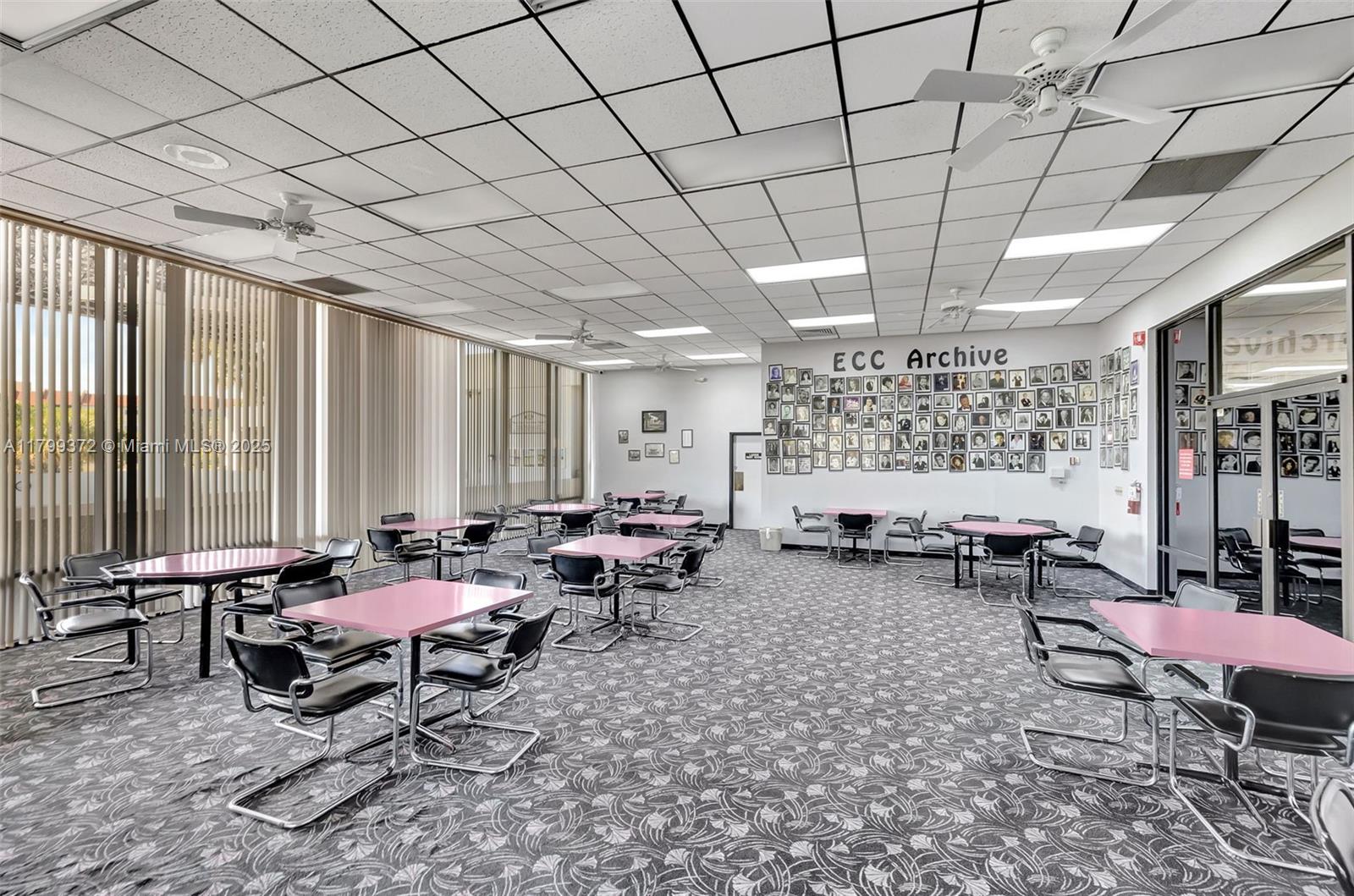 7080 Environ Boulevard, Unit 223 Lauderhill, FL 33319 - Photo 29 of 36 a living room with furniture and a large window