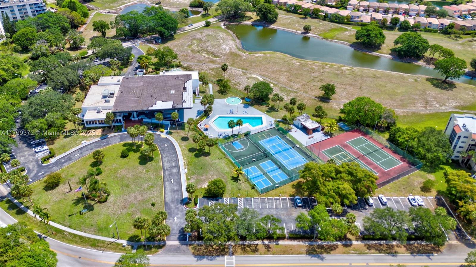 7080 Environ Boulevard, Unit 223 Lauderhill, FL 33319 - Photo 34 of 36 an aerial view of a houses with yard