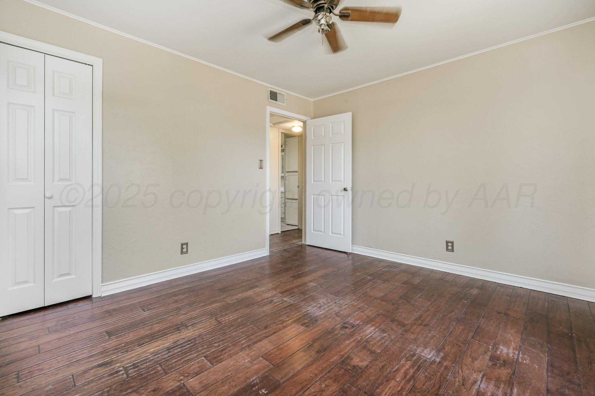 4004 South Van Buren Street Amarillo, TX 79110 - Photo 9 of 17 a view of an empty room with a window