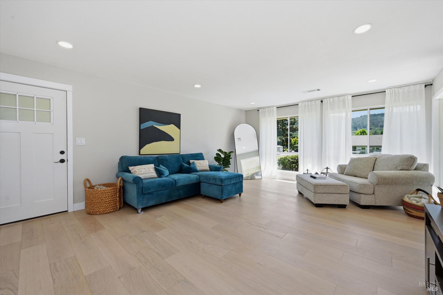 23 Valley Green Street Santa Rosa, CA 95409 - Photo 3 of 58 a living room with furniture and a large window
