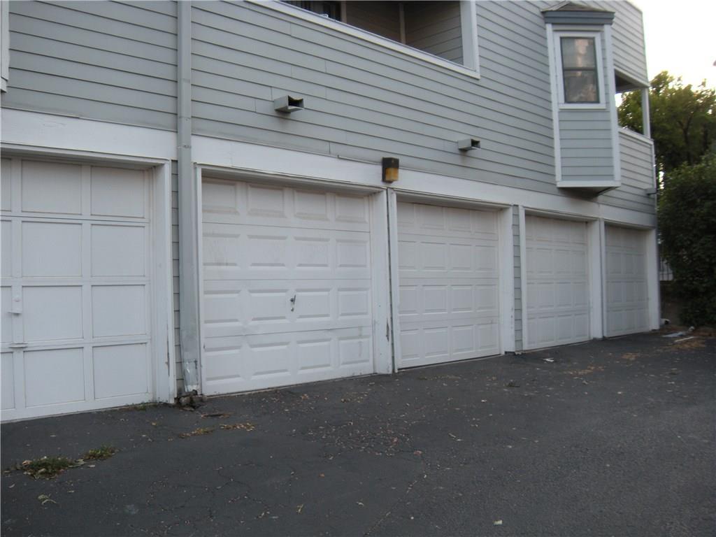 1808 Rio Grande Street, Unit 11 Austin, TX 78701 - Photo 5 of 5 a view of a house with garage