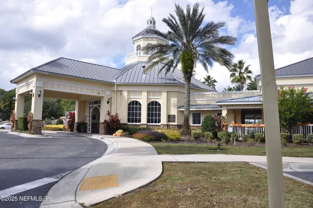 a view of a house with backyard porch and patio