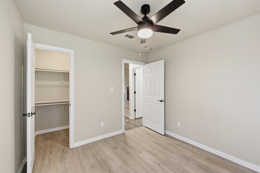 8875 Fm 2450 Sanger, TX 76266 - Photo 16 of 28 wooden floor in an empty room