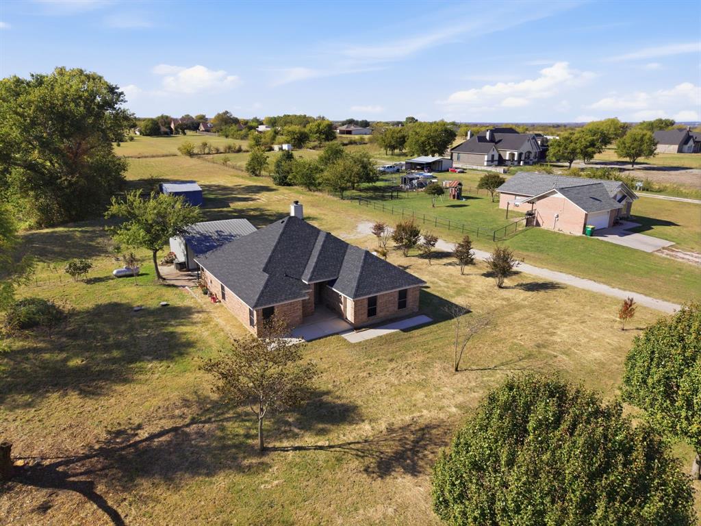 8875 Fm 2450 Sanger, TX 76266 - Photo 3 of 28 a view of a lake with houses