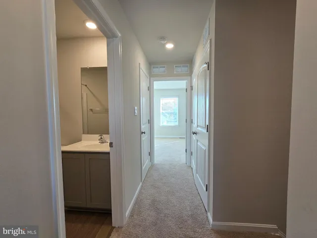 a bathroom with a sink a toilet and a bathtub