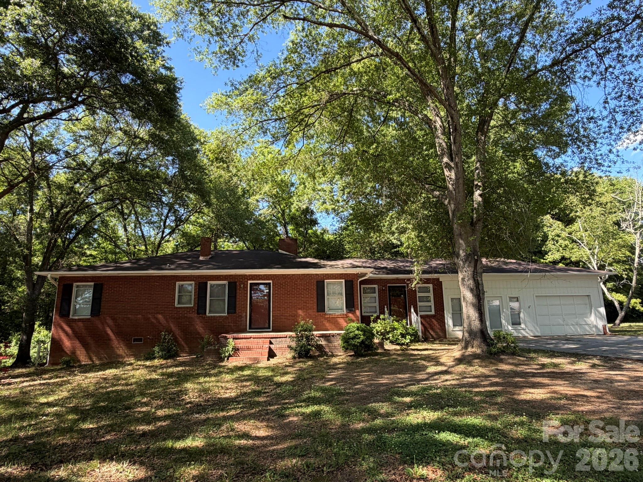 382 Alexis High Shoals Road Dallas, NC 28034 - Photo 1 of 43 a view of a house with a yard