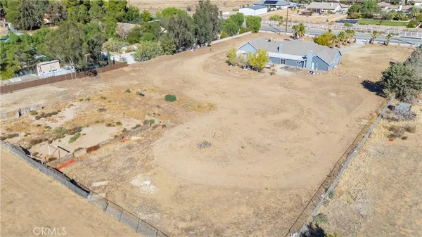 a view of swimming pool with seating space