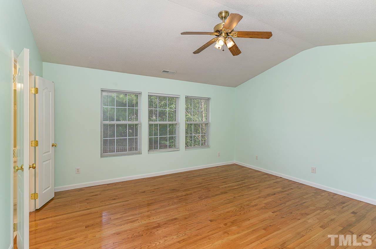 5601 Orchard Gate Way Raleigh, NC 27616 - Photo 7 of 28 a view of an empty room with a window