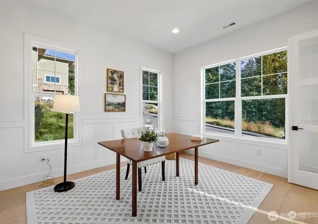 a bathroom with a sink double vanity and a mirror