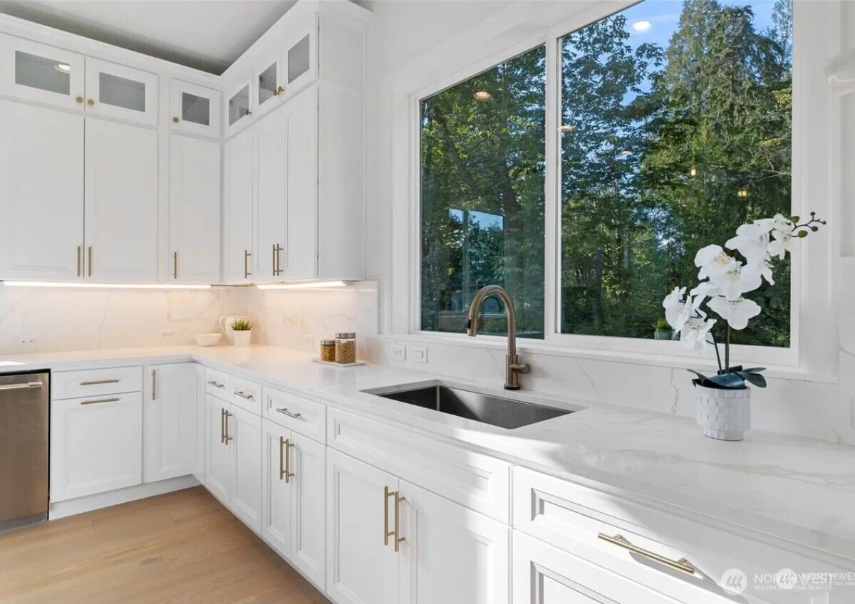 15410 Northeast 103rd Way Redmond, WA 98052 - Photo 6 of 20 a kitchen with a sink and cabinets